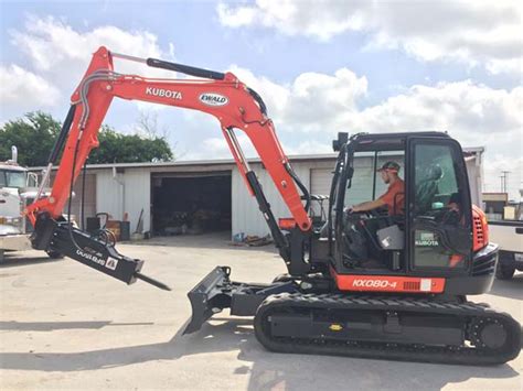 mini excavator breaking concrete|mini excavator with breaker rental.